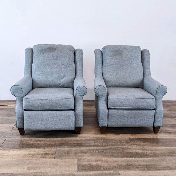 pair of [ unused0 ] wingback chairs in the manner of [ unused0 ]