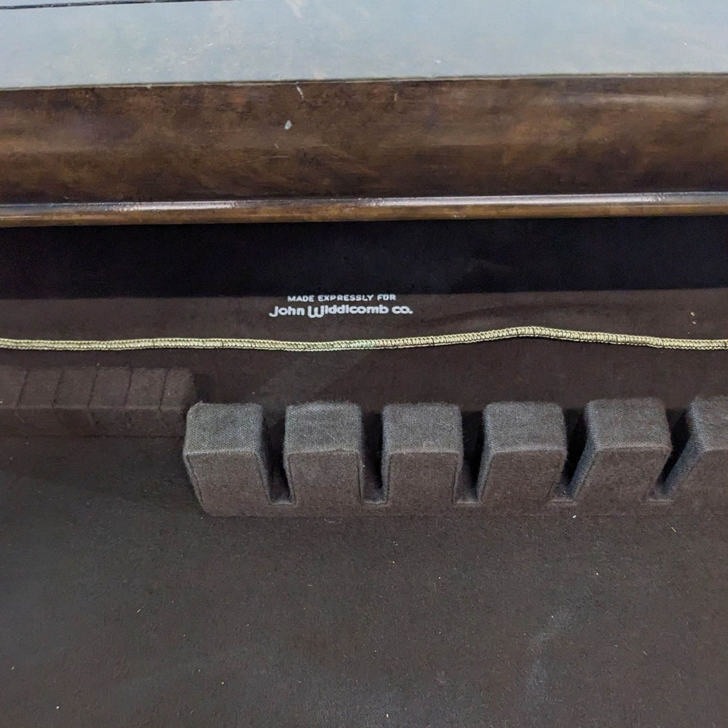 Close-up of interiors labeled "Made expressly for John Widdicomb Co." from a 1960s sideboard.