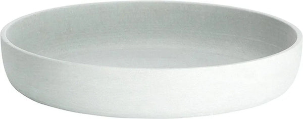 a white bowl with a white base.