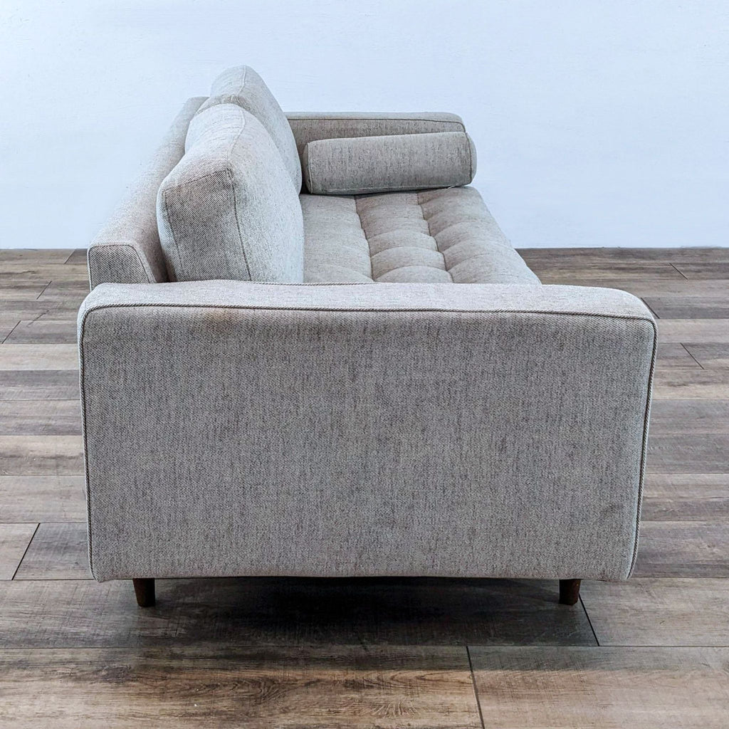 Reperch brand 3-seat tufted sofa, track arms, and tapered legs.  