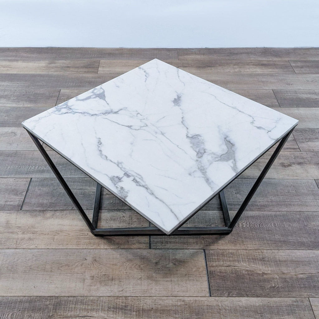 marble coffee table with a black metal base