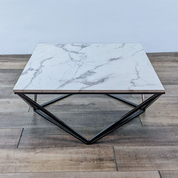 a marble coffee table with a black metal frame.