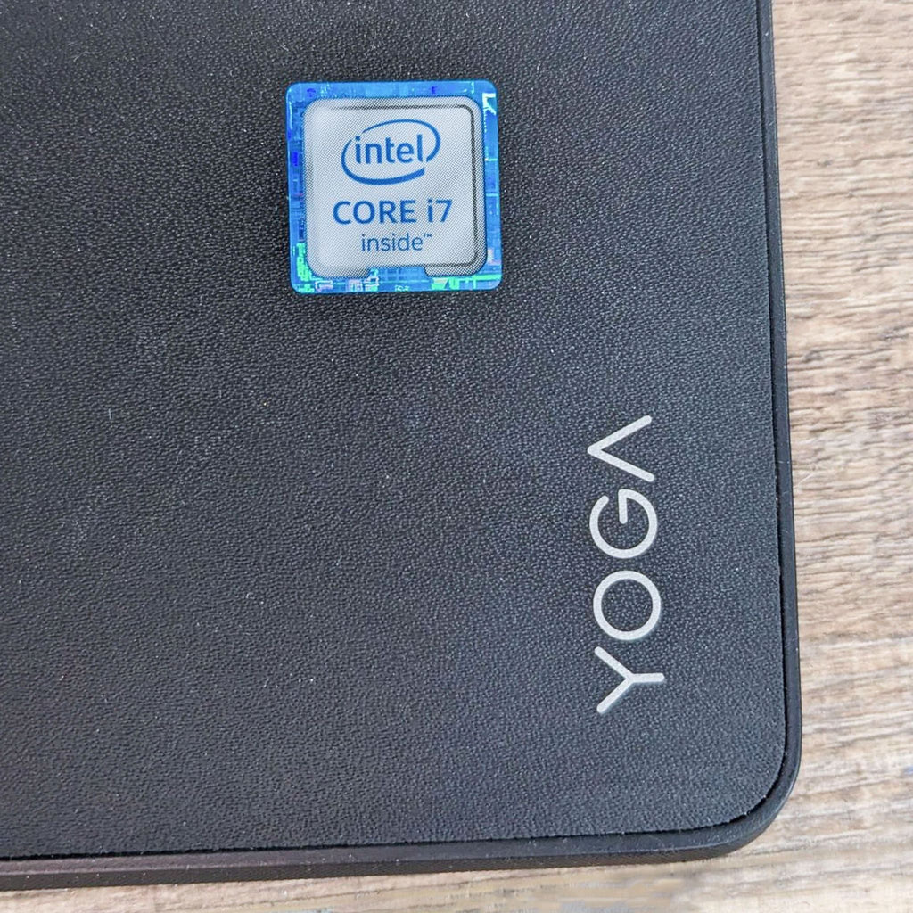 a black laptop computer with a black keyboard 