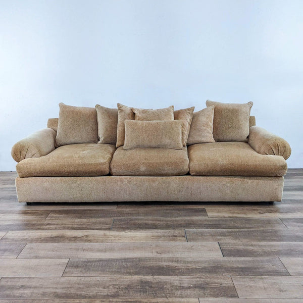 Large 112" sofa with rolled arms, small pattern fabric, three seats.