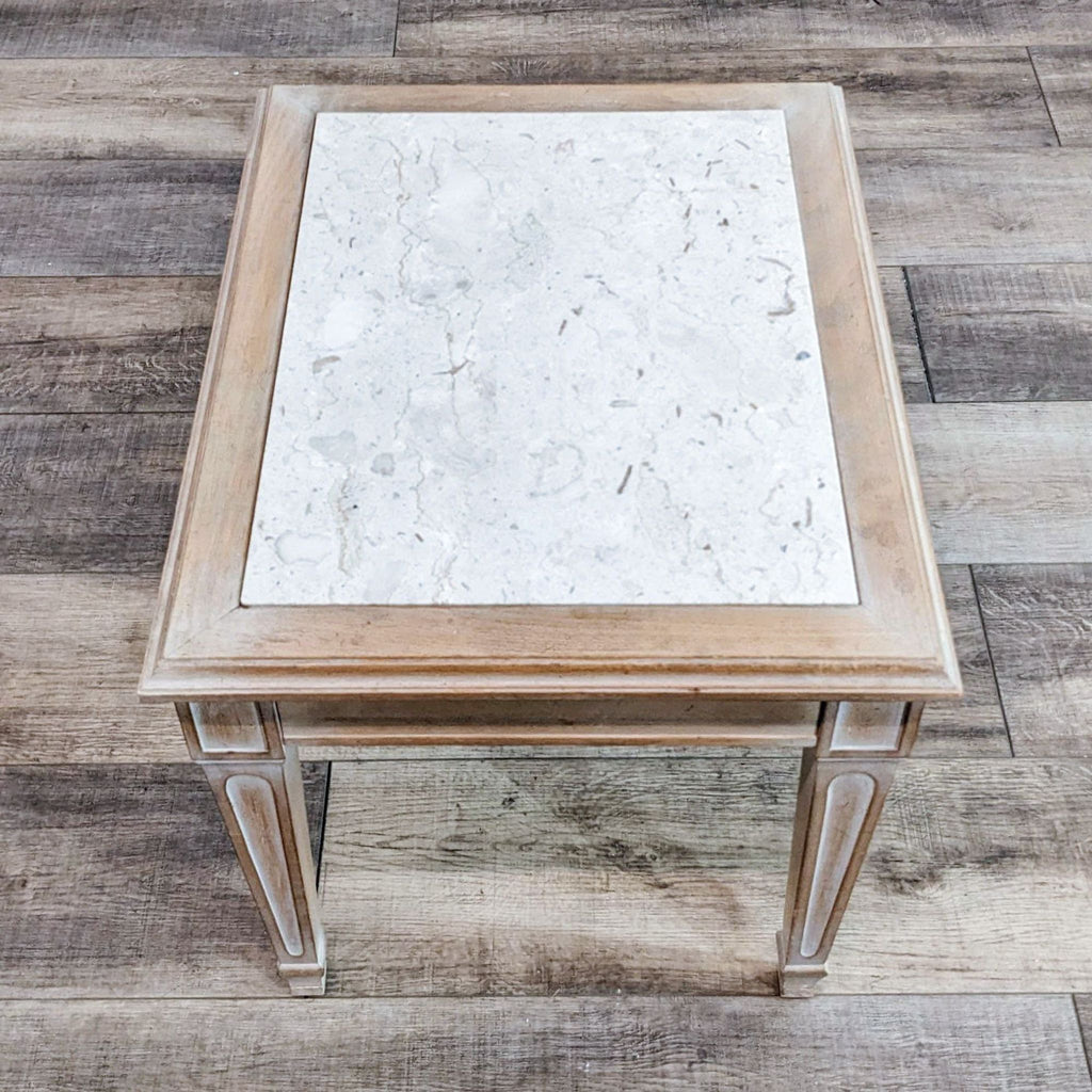 Top view of a Reperch end table with a marble surface detail.
