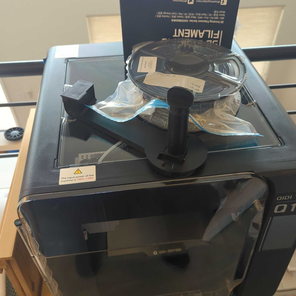 3D Printer: QIDI Q1 Pro model, bought in mid-2024, hardly used, displayed on a flat surface.