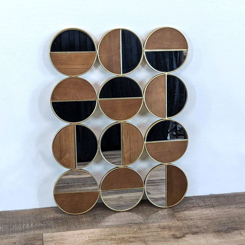 1. The Cycle Mirror by Zuo Modern with twelve round mirrors, each half wood, half mirror in gold steel frames.