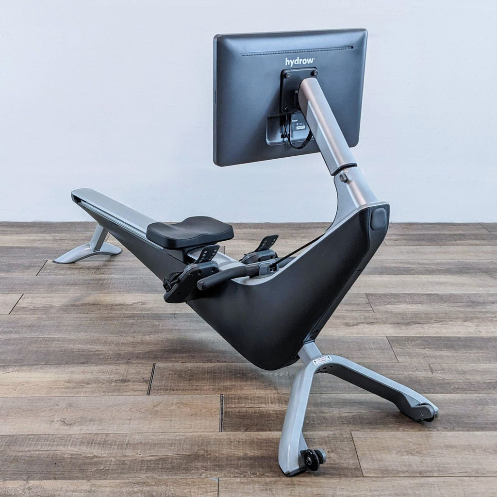 Hydrow rowing machine with a sleek design and integrated screen.