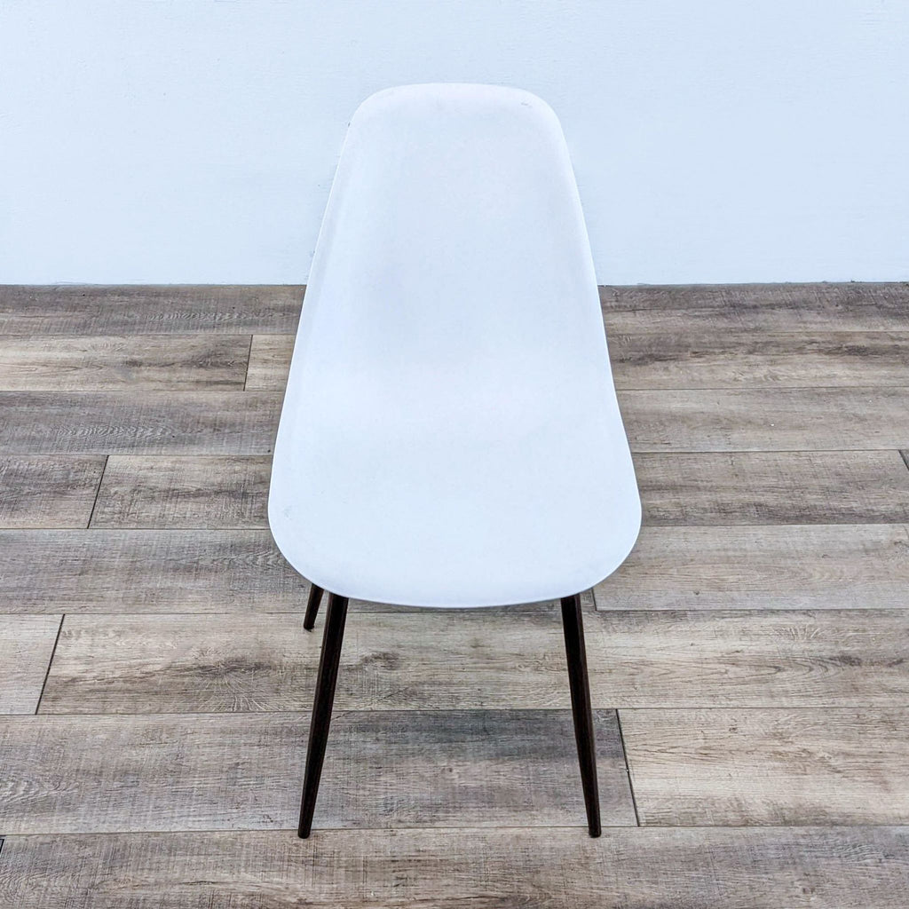 the chair is a modern design with a modern twist.