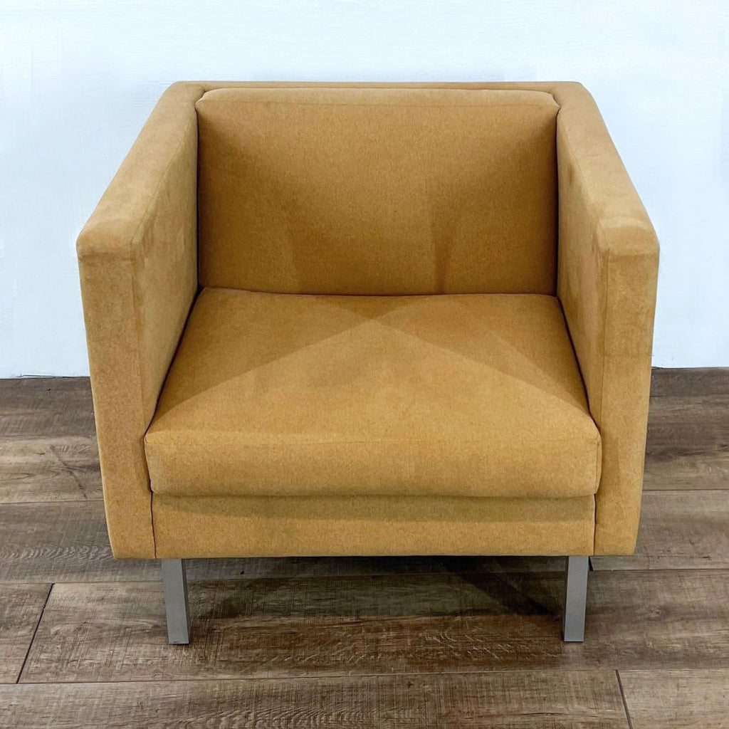 Nienkamper modern lounge chair with metal legs and fabric upholstery.