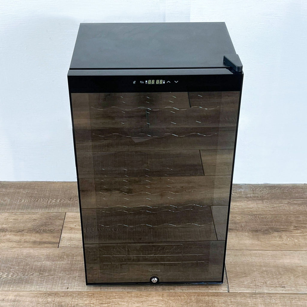 Ivation refrigerator with sleek glass front on a wood floor.