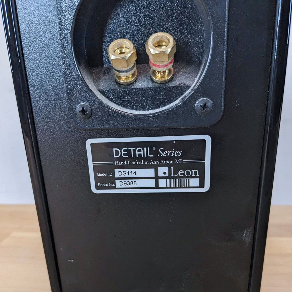 Back view of Leon speaker with connectors and label.