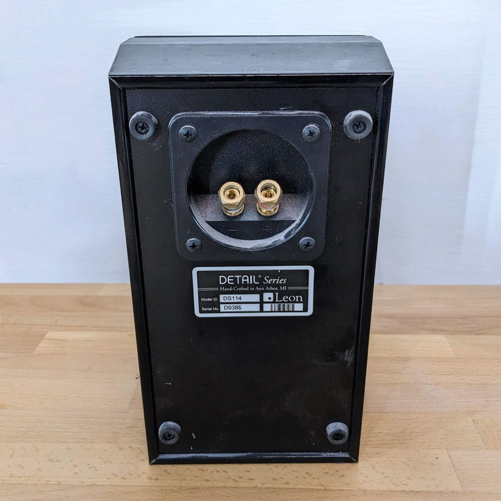 Leon speaker detail showing connectors and label info.