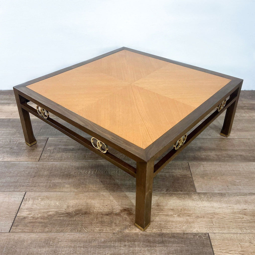 Square coffee table with chevron inlaid top and brass details.  