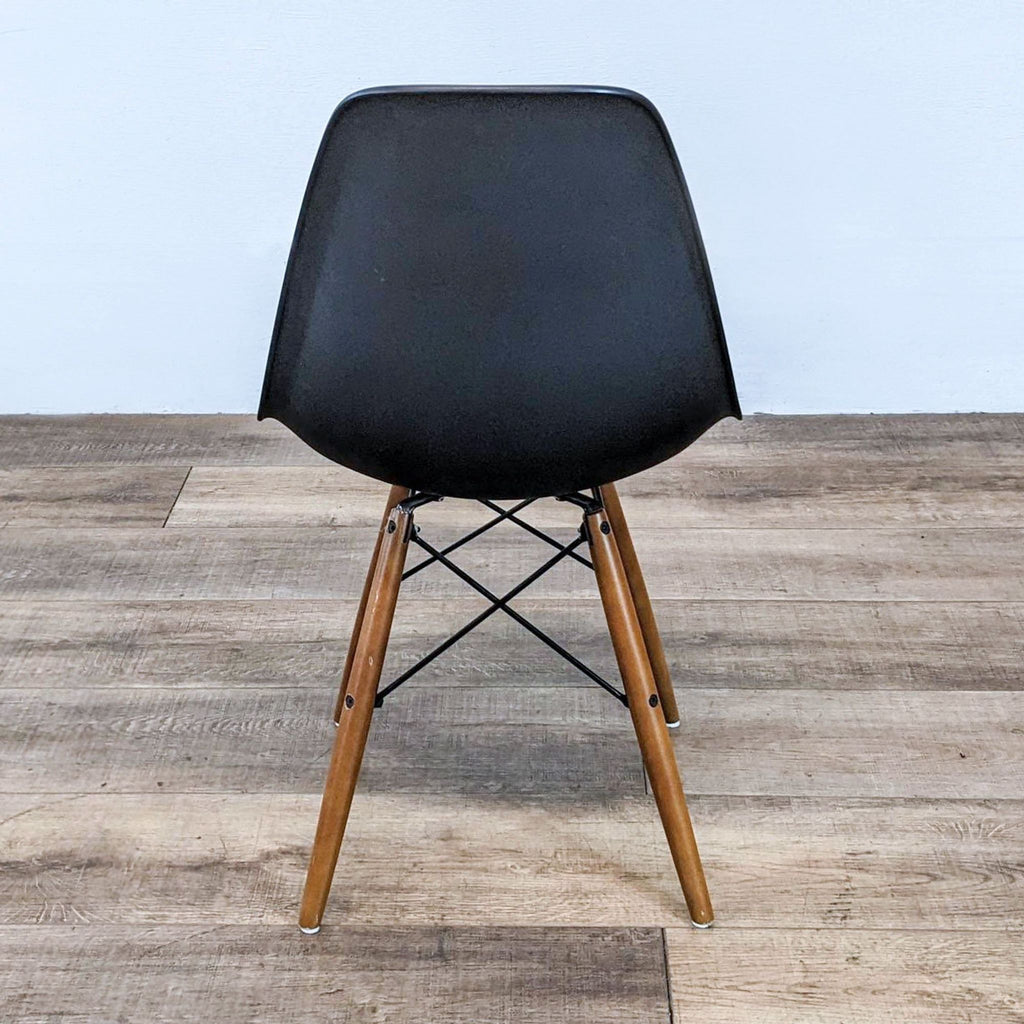 black leather dining chair with a black leather base