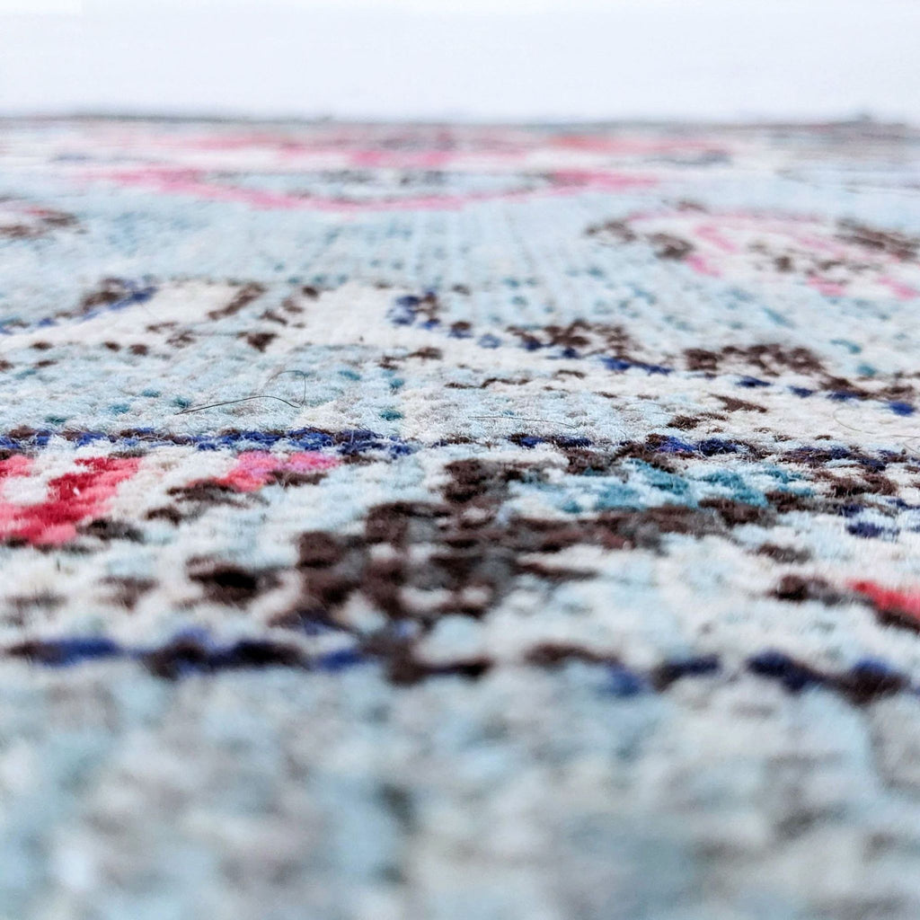 Close-up of rug texture highlighting intricate weave.
