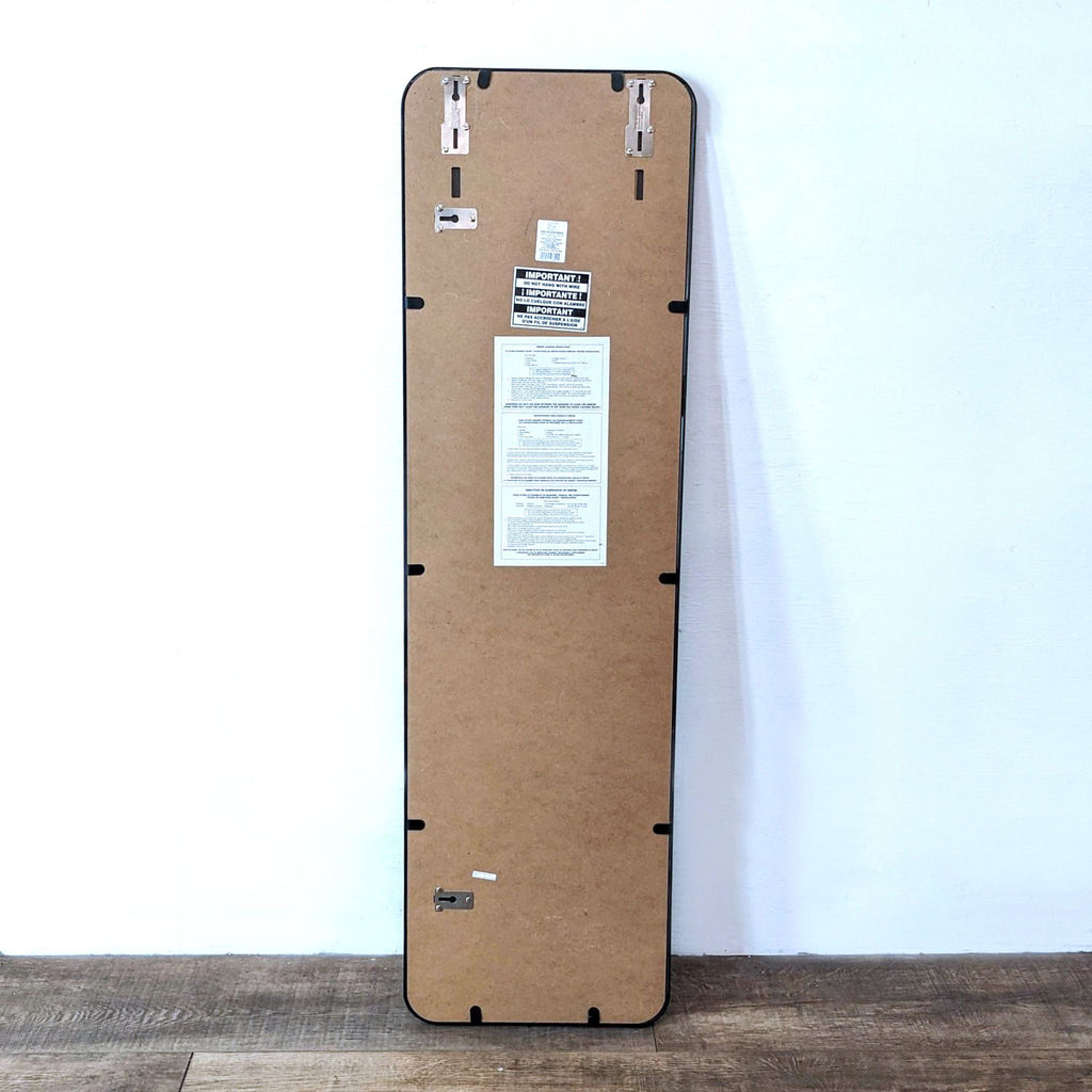 Back view of the Project 62 mirror, showing mounting hardware and detailed instructions.