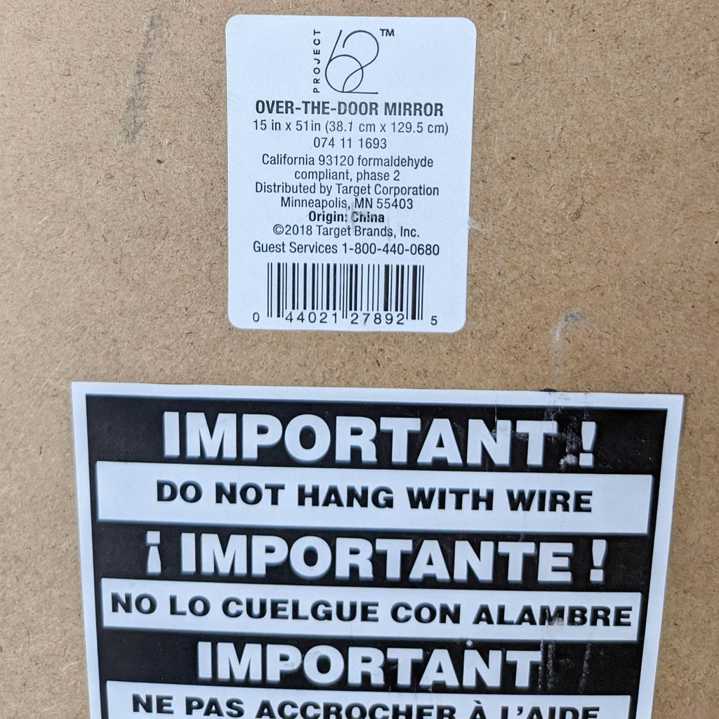 Close-up of instructions and barcode on the back of the Project 62 over-the-door mirror.