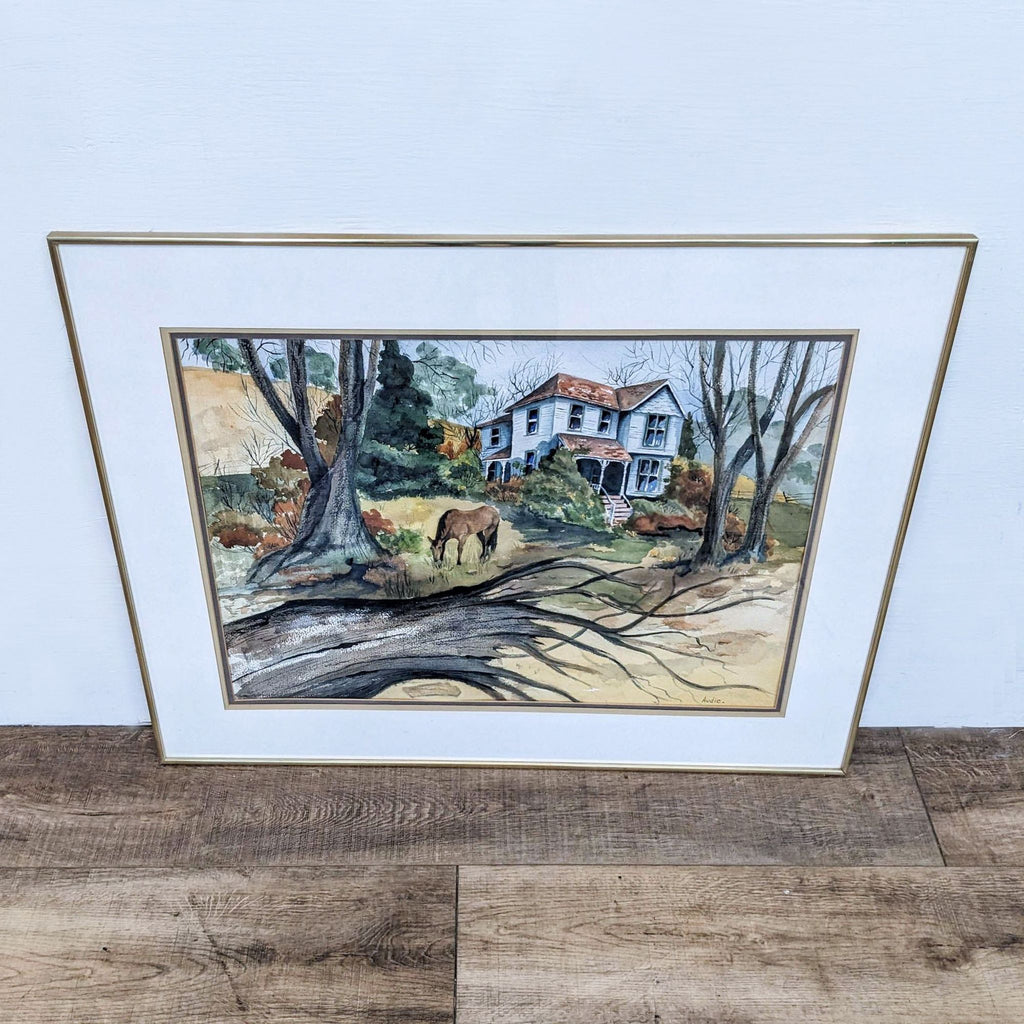 Framed painting of a rural scene with a horse and house, signed by Audie.