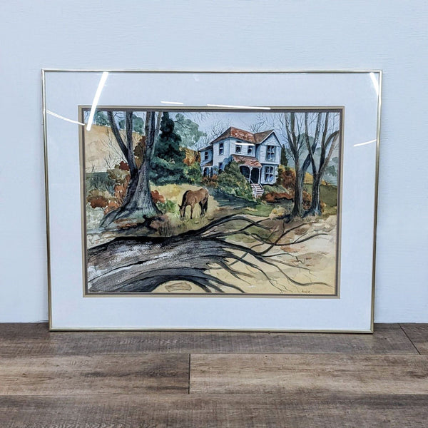 Framed country scene depicting a white house and horse, signed by Audie.