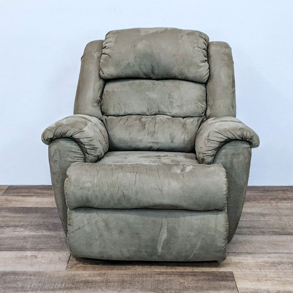 Front view of a green La-Z-Boy rocker recliner with plush armrests.