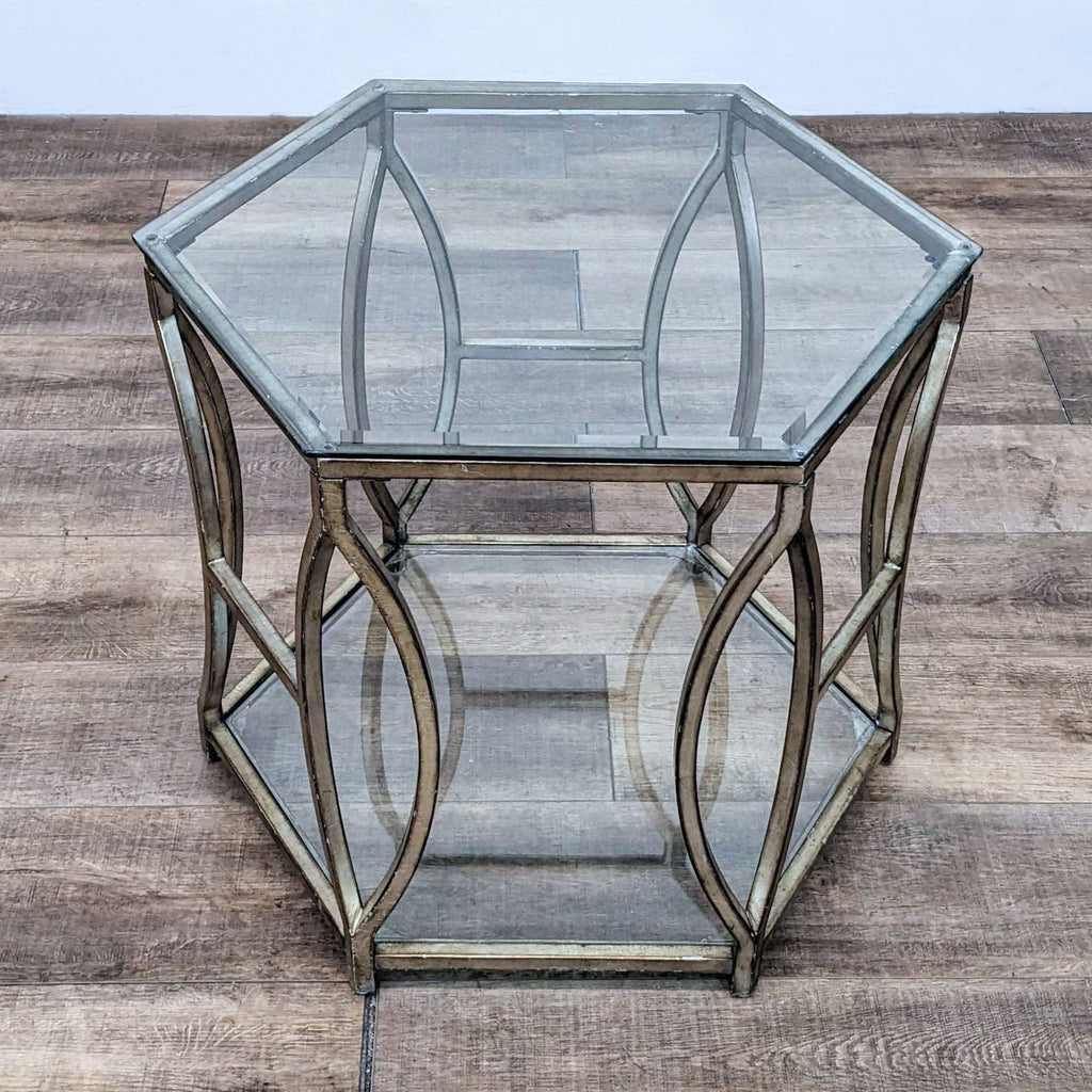 2. Top-down view of Z Gallerie hexagonal end table with clear glass surfaces and curved gold-tone metal frame.