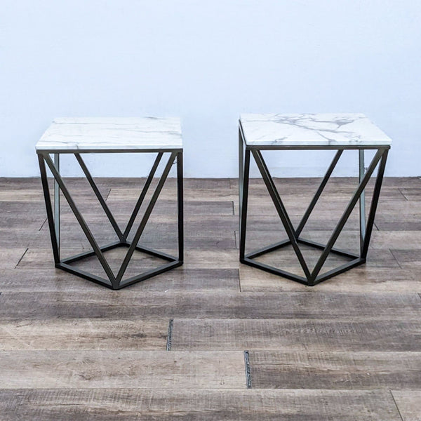 End table with faux marble top and geometric metal base.