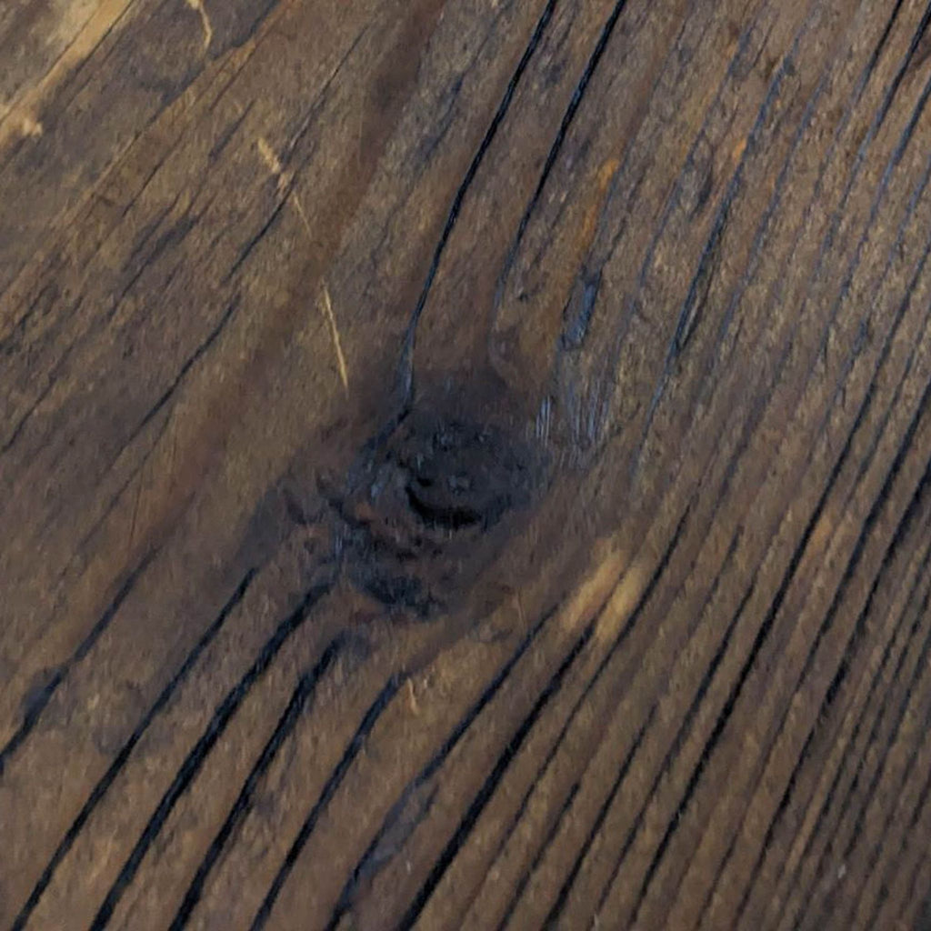 Close-up of the Reperch coffee table's wood grain texture.