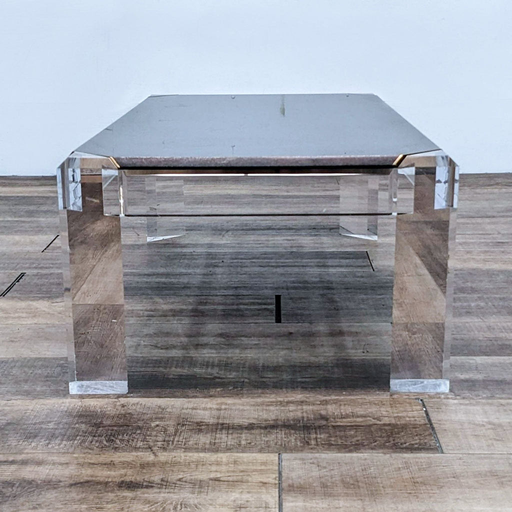 Front angle of a modern black-lipped Reperch coffee table.