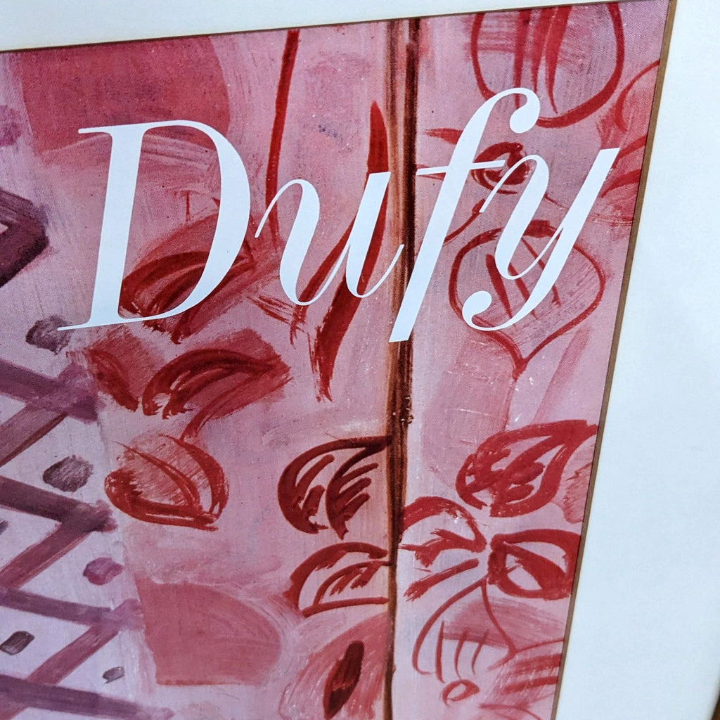 Close-up of "Dufy" signature on a pink patterned background from the framed art print.