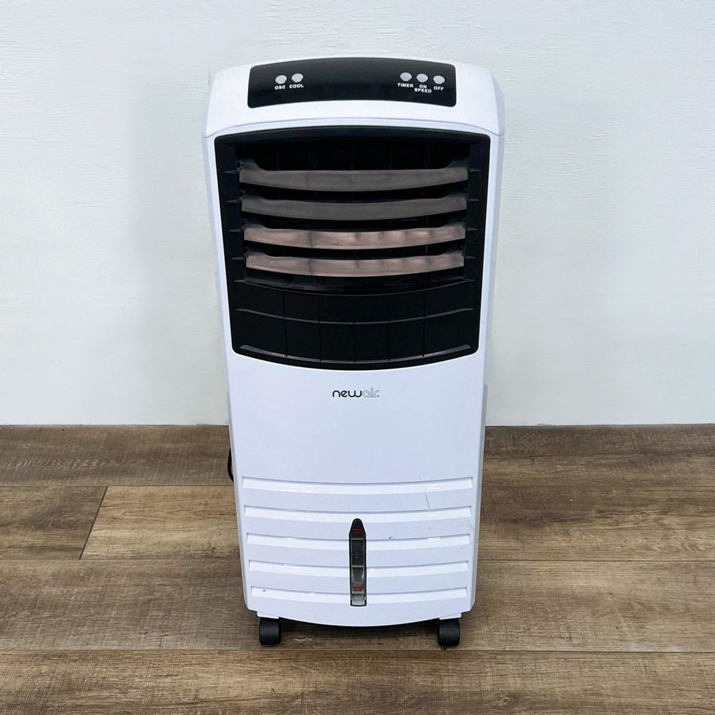 NewAir portable AC unit with black and white design, front view.