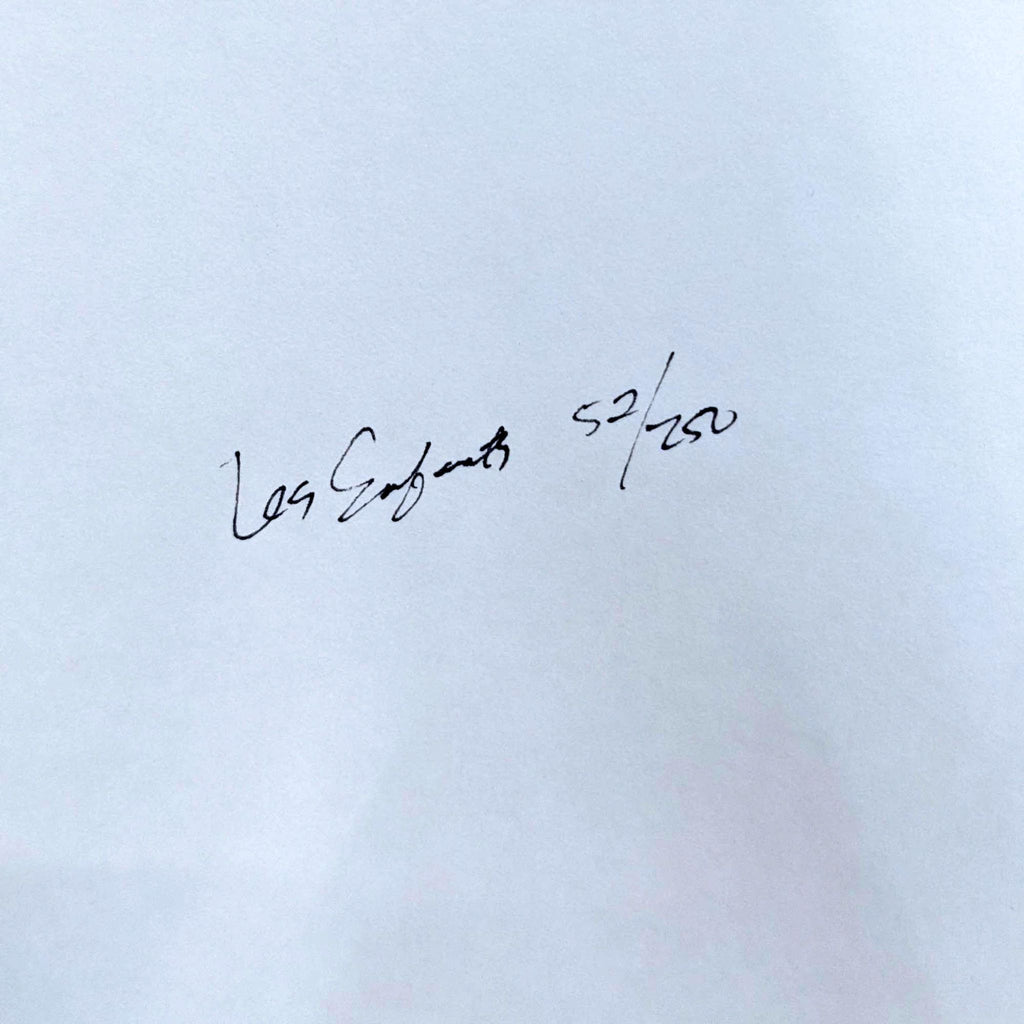 Handwritten note reading "Les Enfants 52/250" on white background.