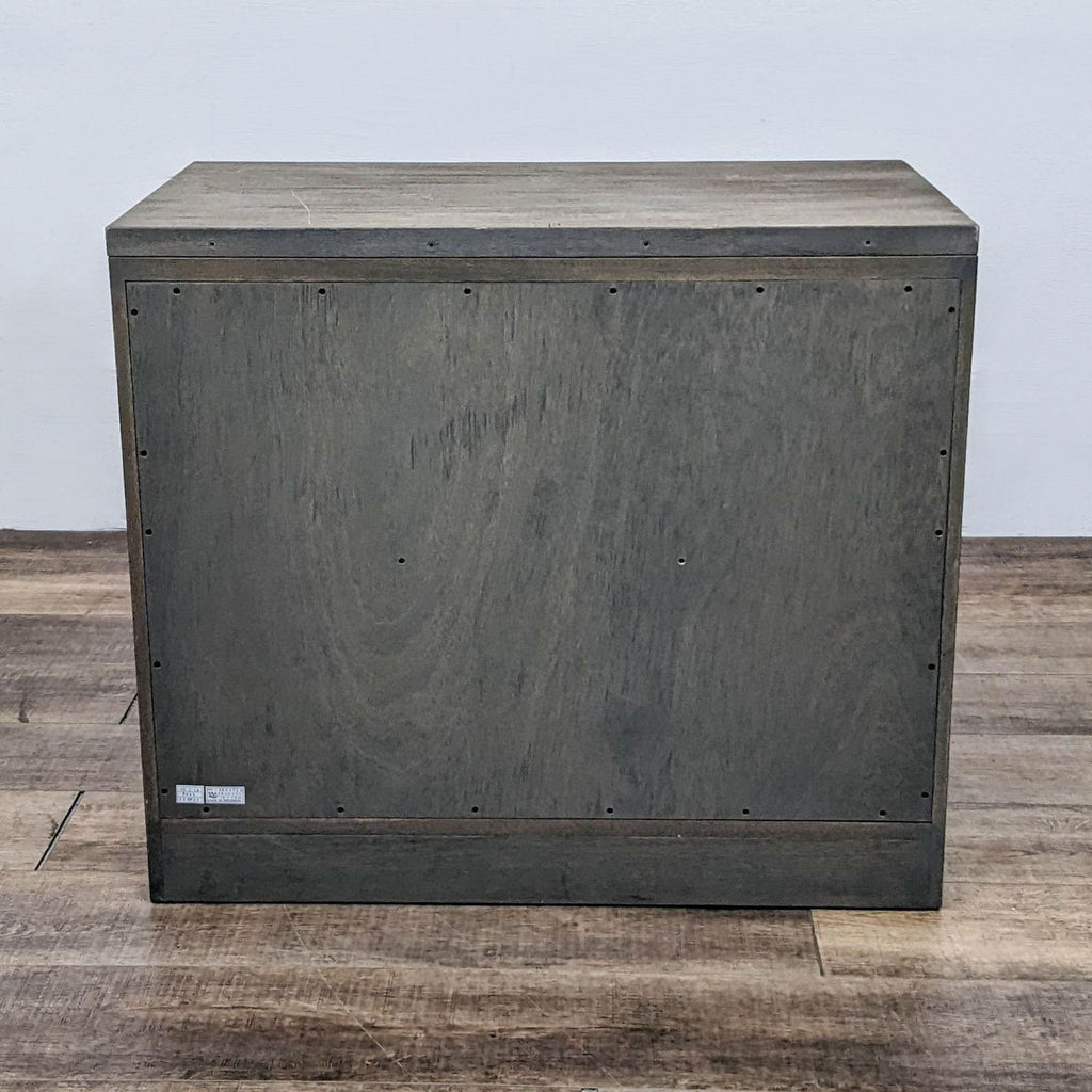 Rear view of Pottery Barn 2-drawer cabinet, solid meranti wood construction.