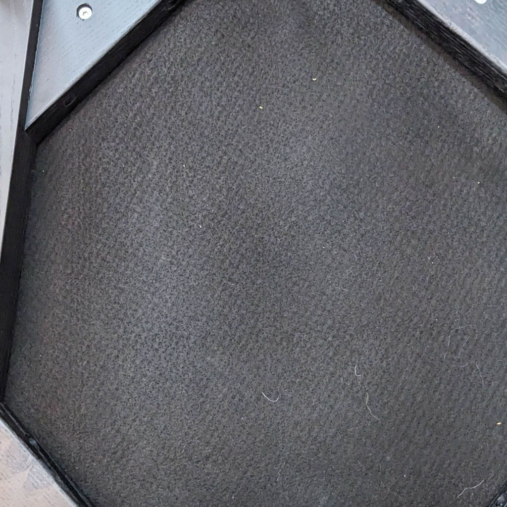 Close-up of the seat upholstery on a Reperch dining chair, showing the fabric texture and stitching detail.