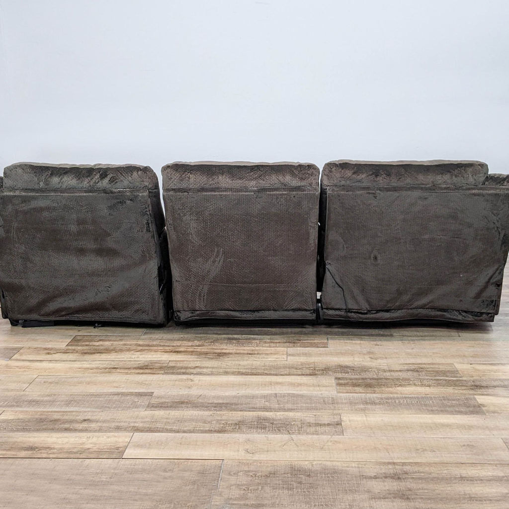 Back view of brown fabric Reperch sectional showing three segments. Pillow top arms visible.