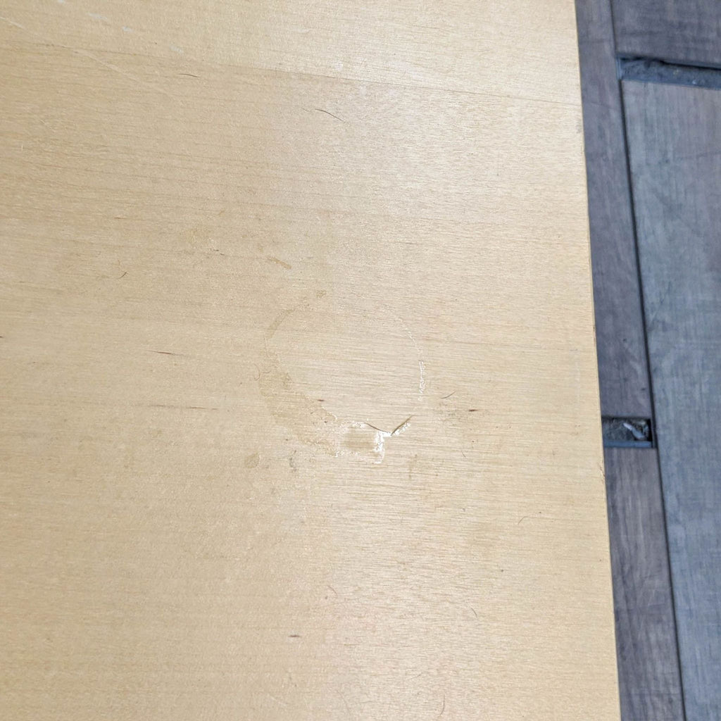 Close-up of the Brasilia table's wood surface with subtle markings.