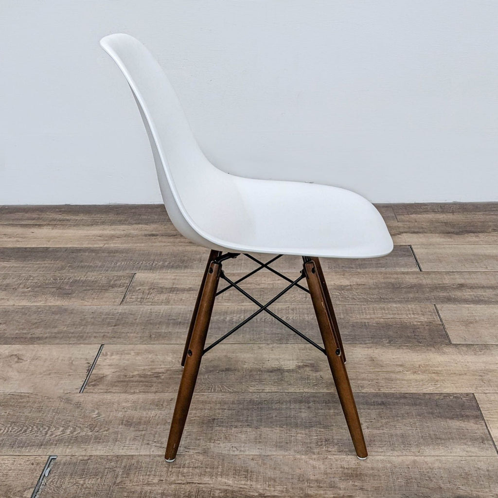 the [ unused0 ] chair by [ unused0 ]