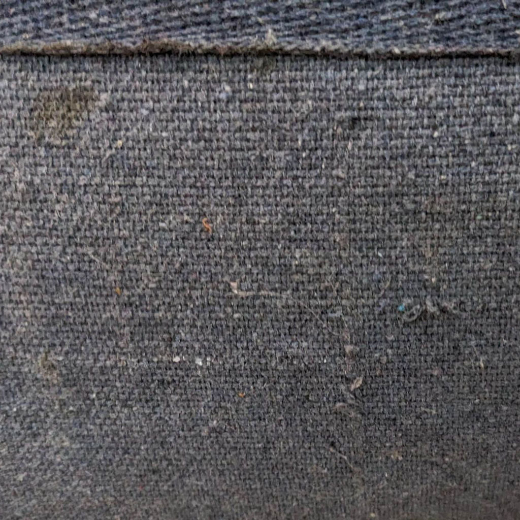 Backside of the World Market Dehra Jute rug showing its detailed weave.
