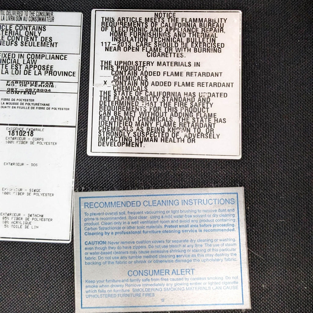 Close-up of sofa tags showing safety and care instructions.