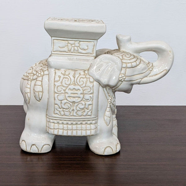 Porcelain elephant garden stool with intricate carvings by Reperch.