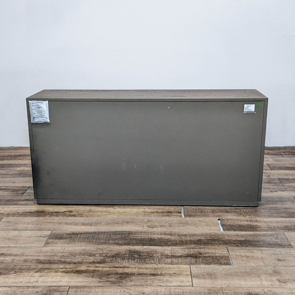 Back view of Bassett's Modern Astor Dresser, showcasing its sturdy construction in grey.