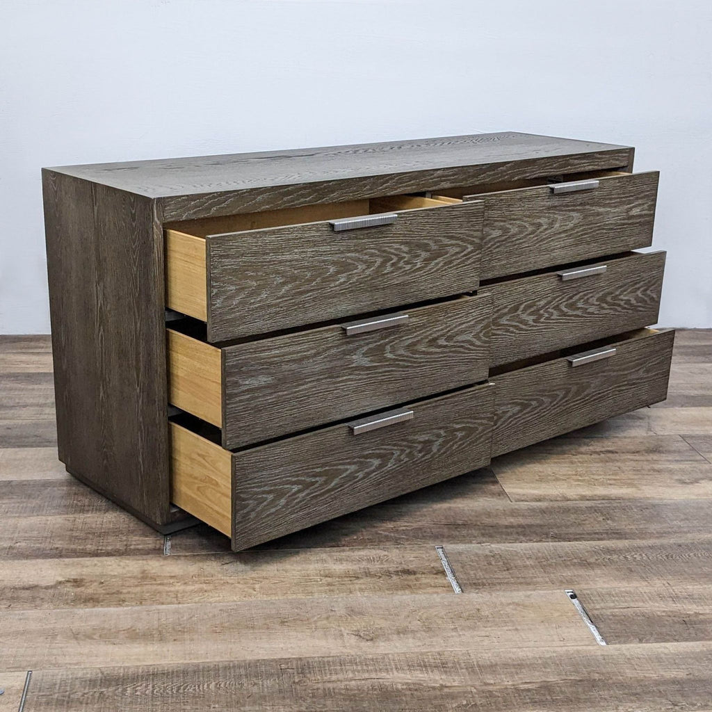 Bassett solid oak dresser features soft-close drawers and a sleek Normandy Grey finish.