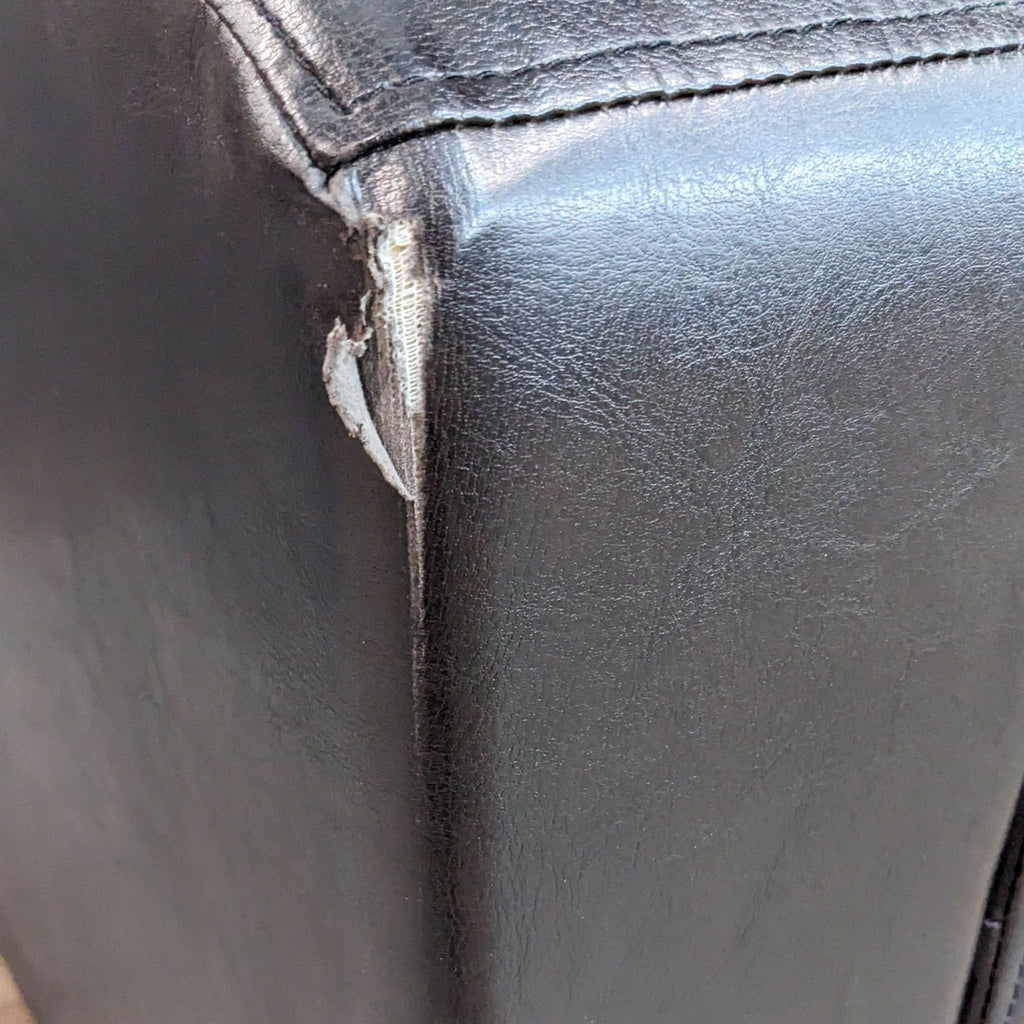 Compact Leather Look Sofa