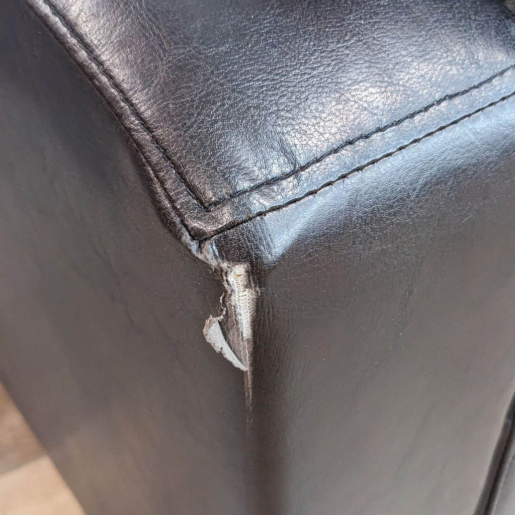 Compact Leather Look Sofa