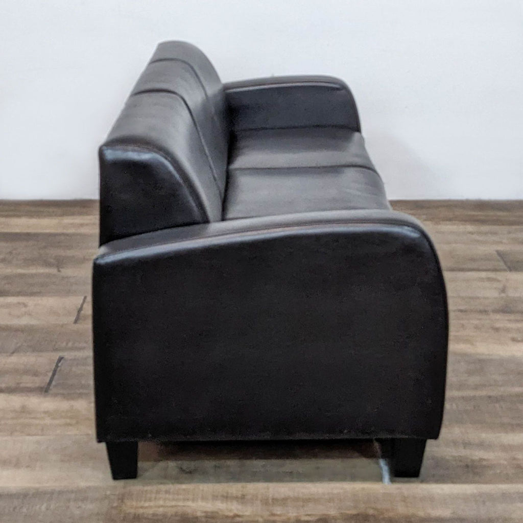 Compact Leather Look Sofa