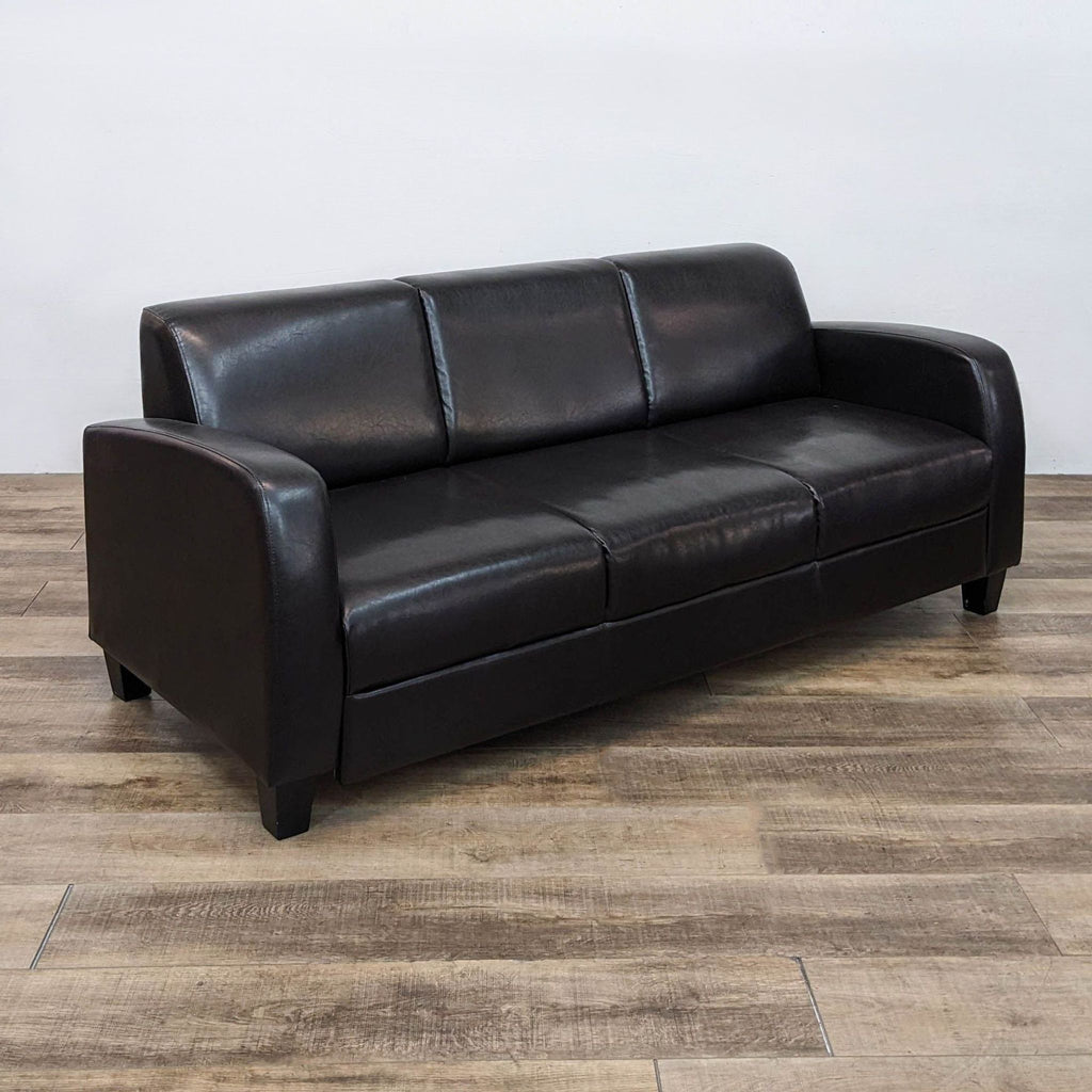Compact Leather Look Sofa