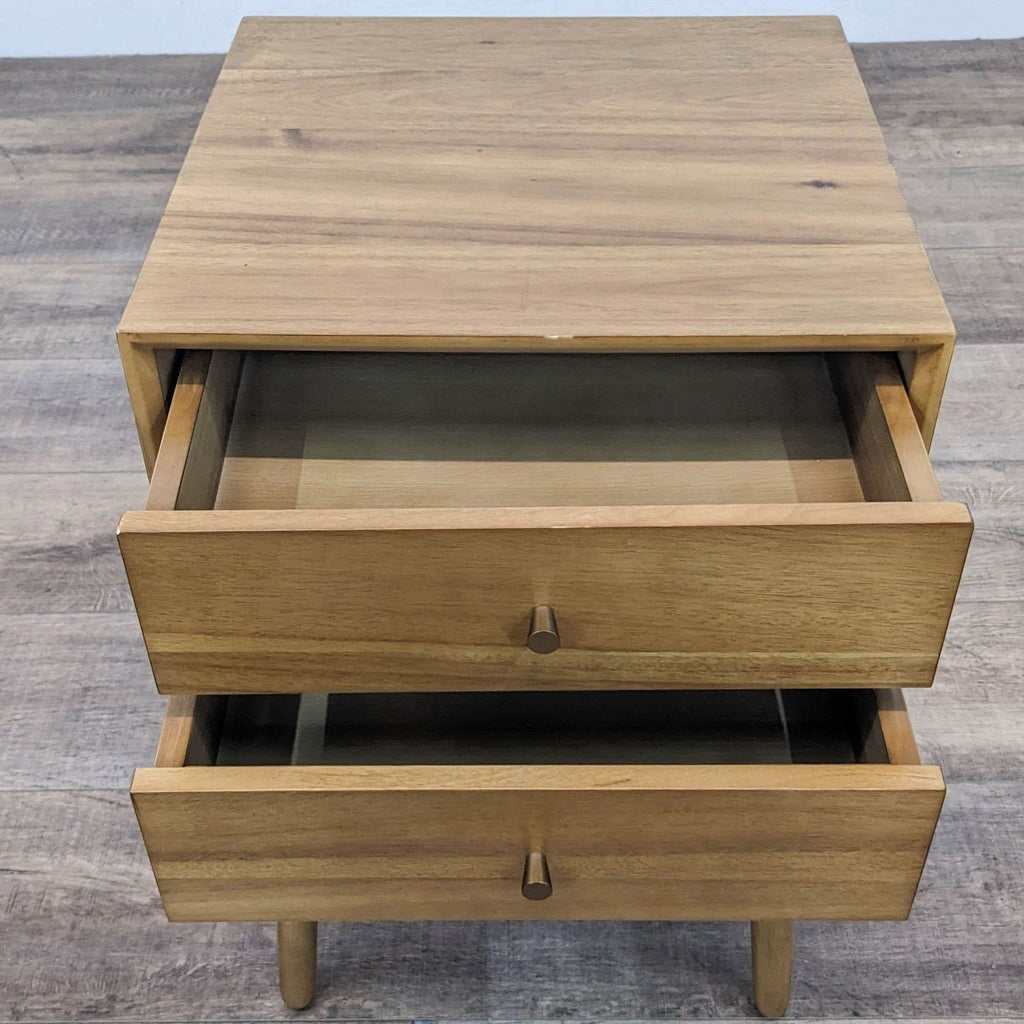 Top view of Reperch End Table showing open drawers, highlighting storage space.