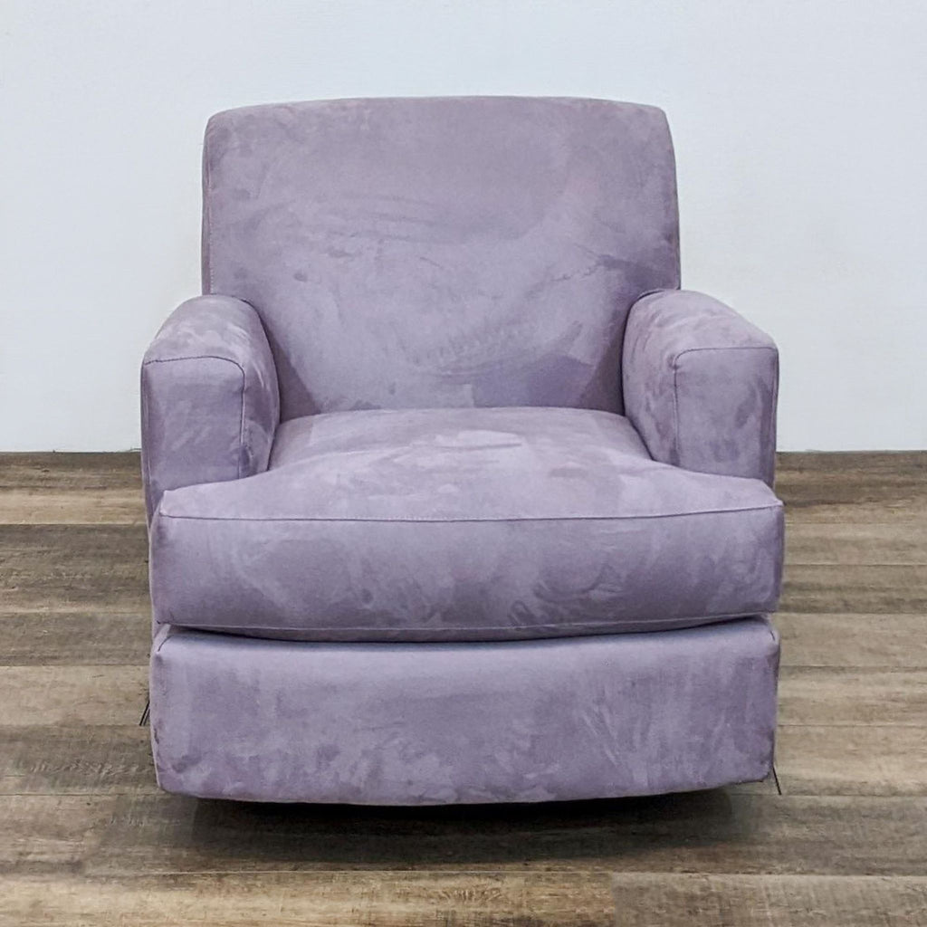 Front view of a plush lavender Carter lounge chair with a swivel base.