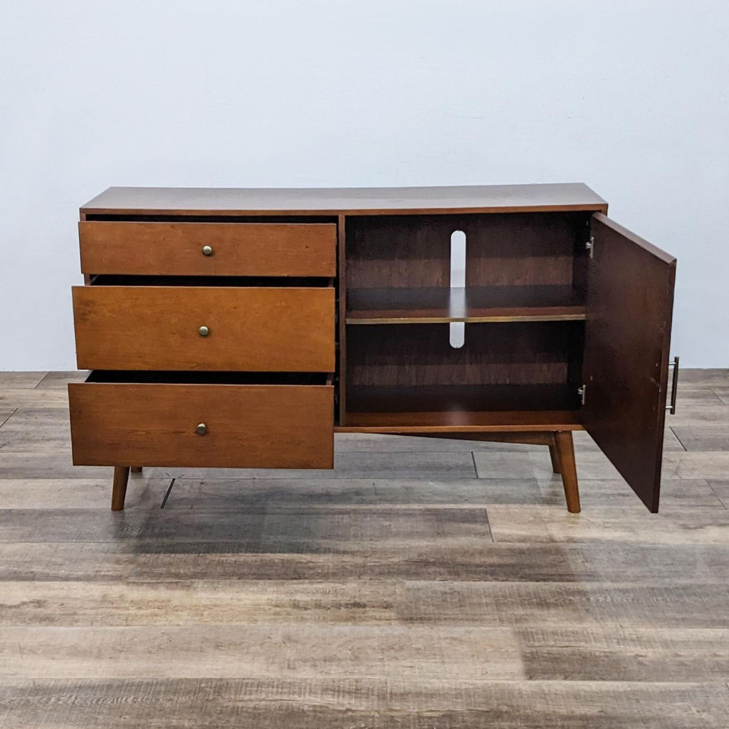 Walker Edison entertainment center open, showing storage shelves and drawers.