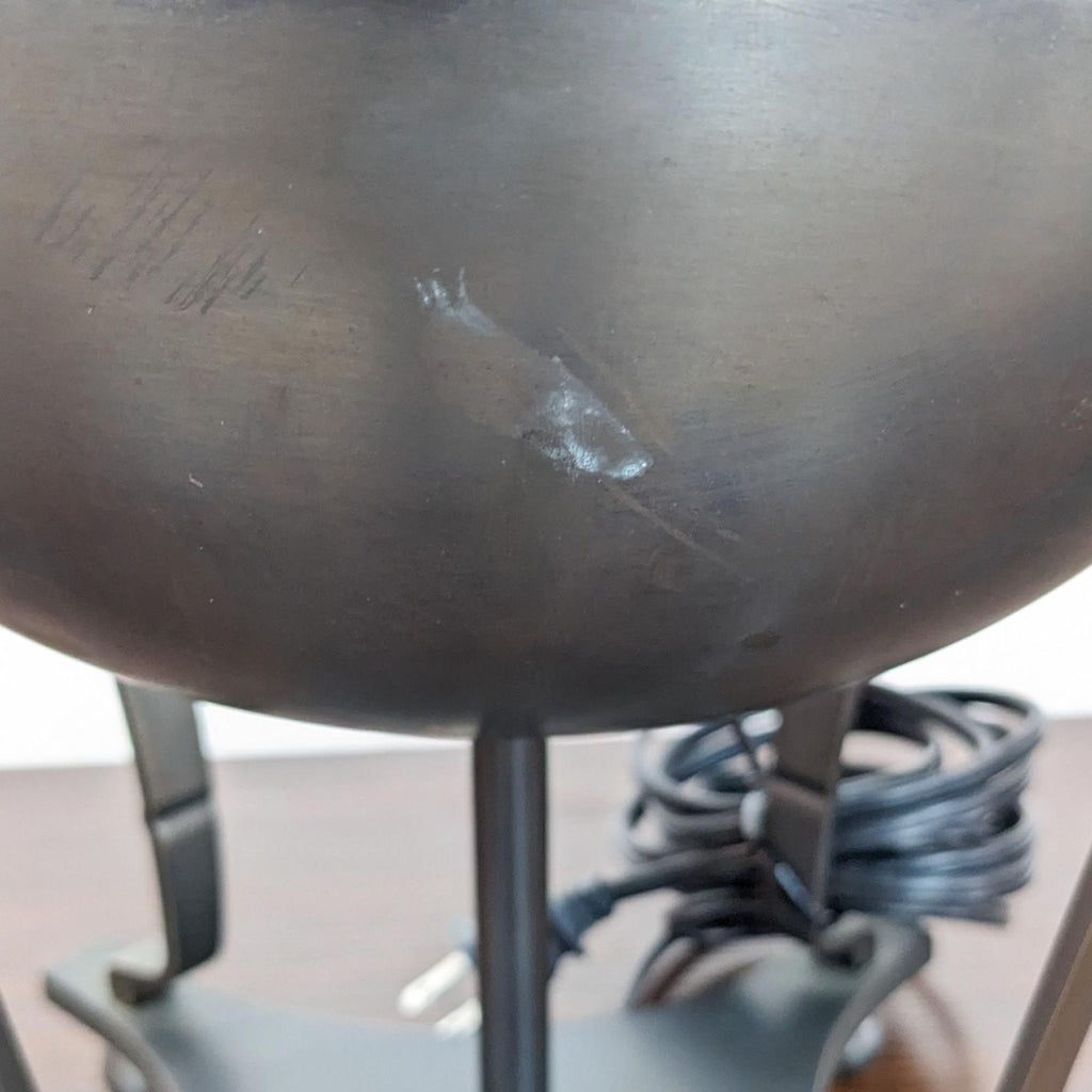 Detail of Reperch lamp showing minor scratches and plugged cord.